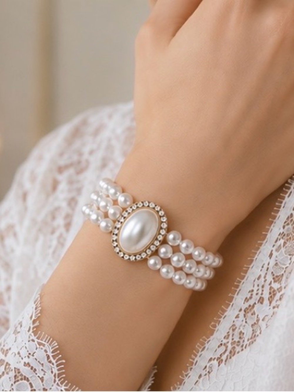 Cream Pearl Multi-Strand Bracelet with Gold Rhinestone Center